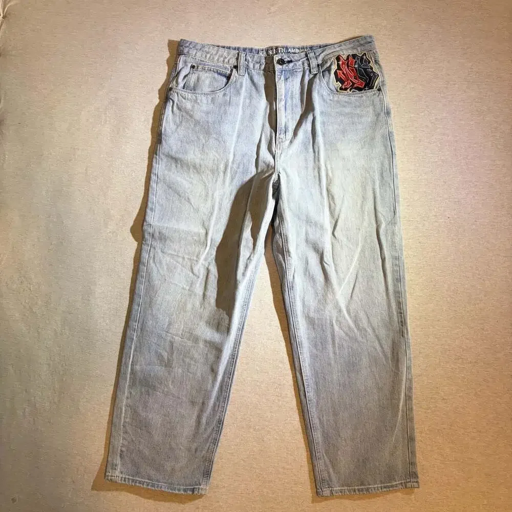 Ninth Hall Ambush Embroidered Skull and Panther Light Wash Baggy Jeans